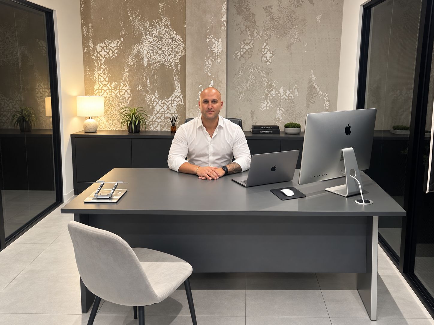 Joe at his desk, building the Tradesman to Investor portfolio